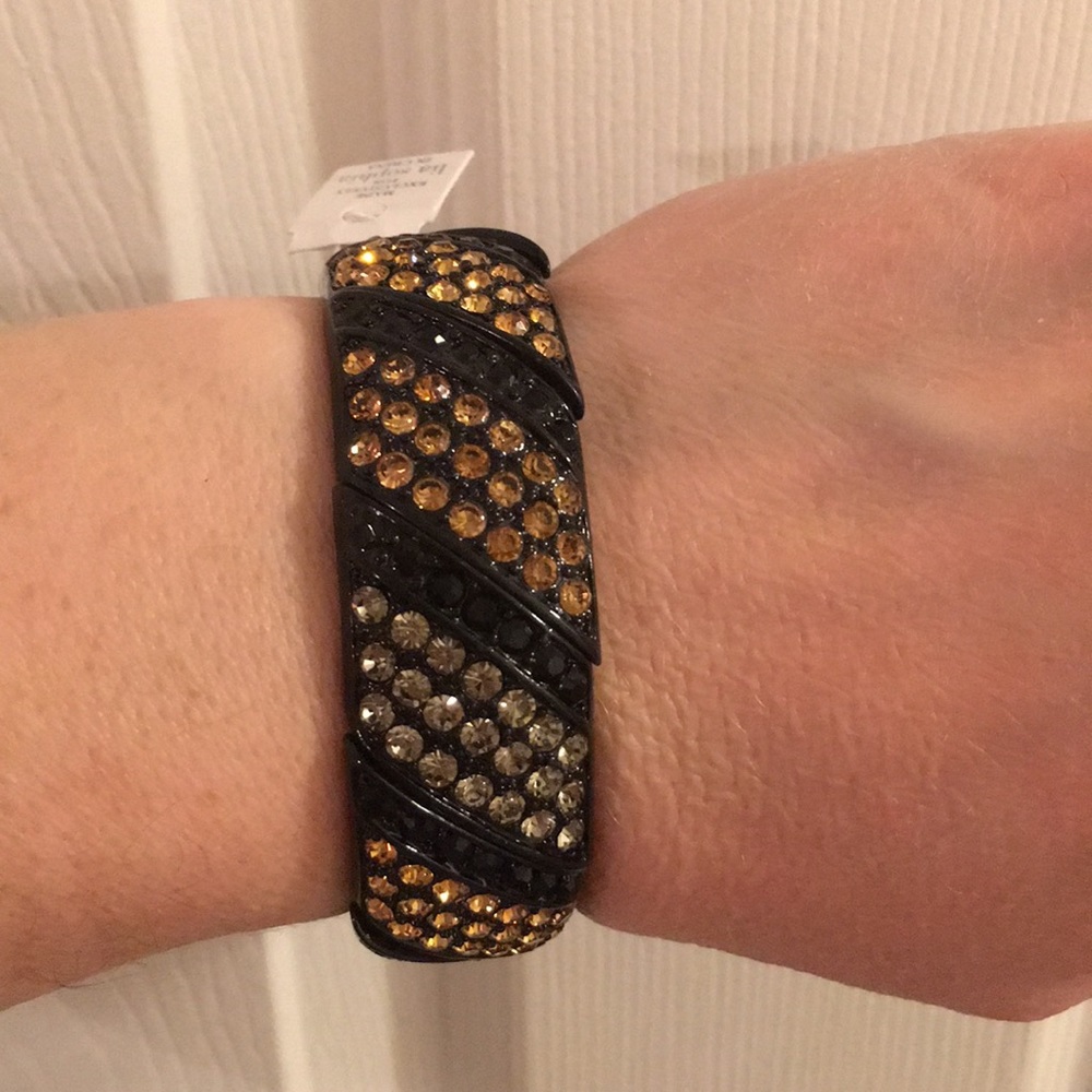 Brand new! Black and gold stretch bangle